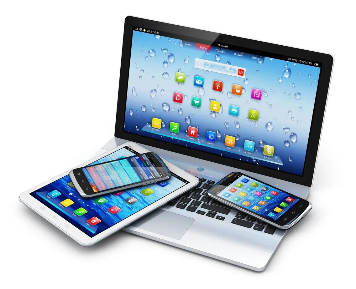 A laptop, tablet and phone are sitting on the table.